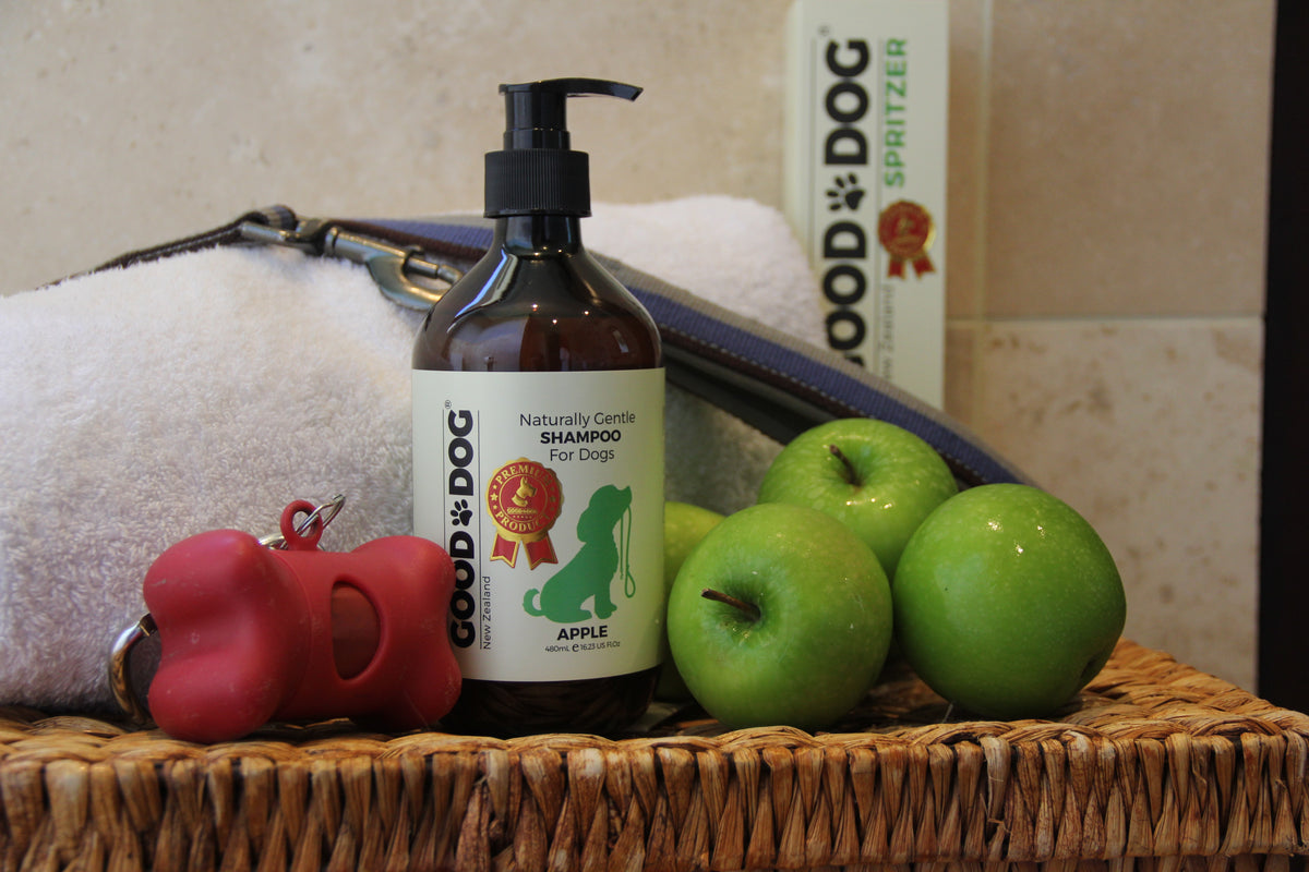 Good Dog apple shampoo with apples and a towel